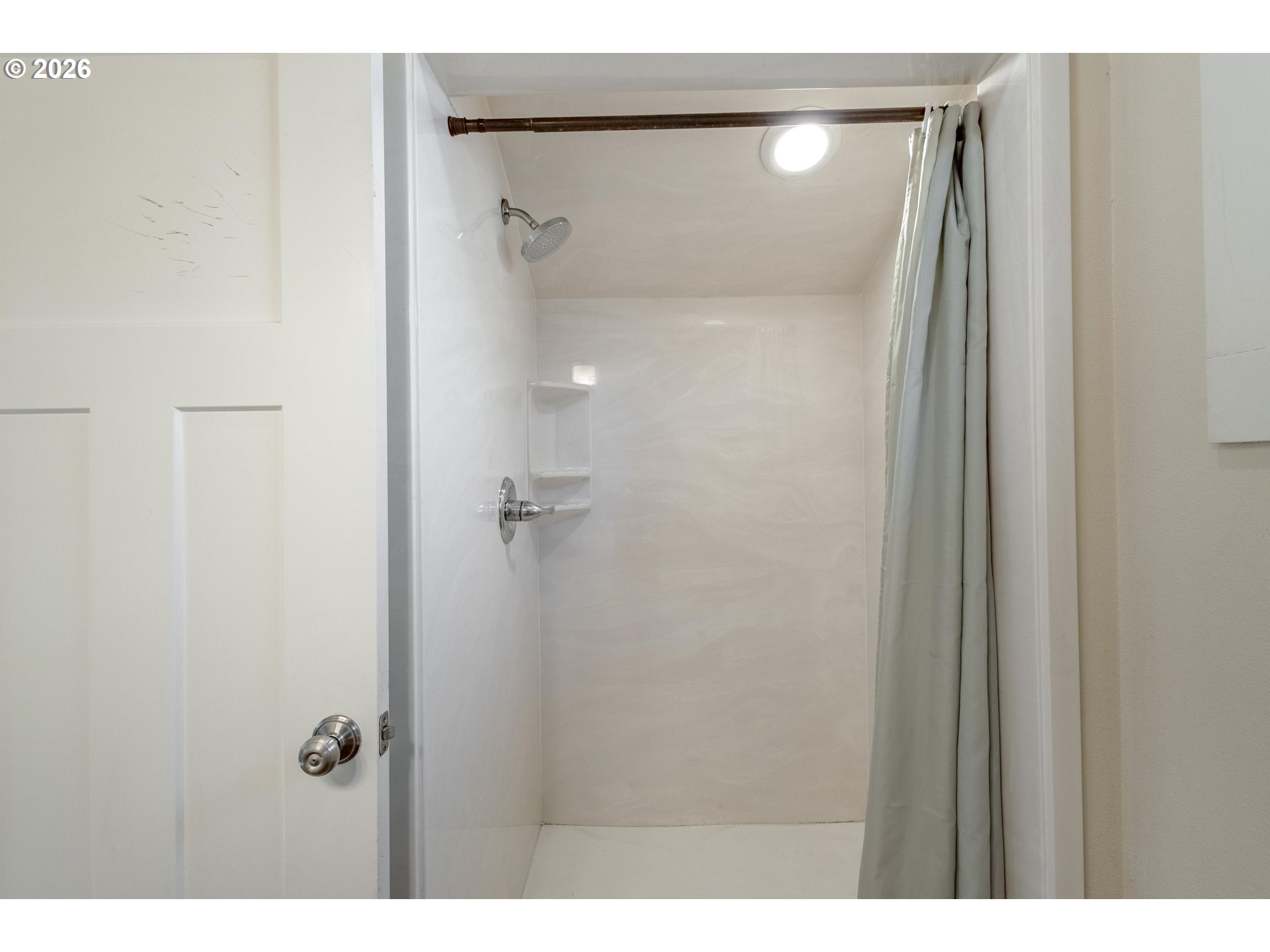 342 Southeast 7th Street Madras, OR 97741 - Photo 10 of 22 a bathroom with a glass shower door