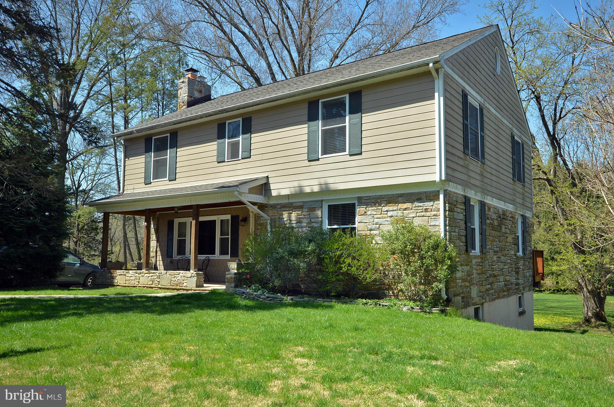 8010 Rider Avenue Baltimore, MD 21204 - Photo 1 of 29 a front view of a house with garden