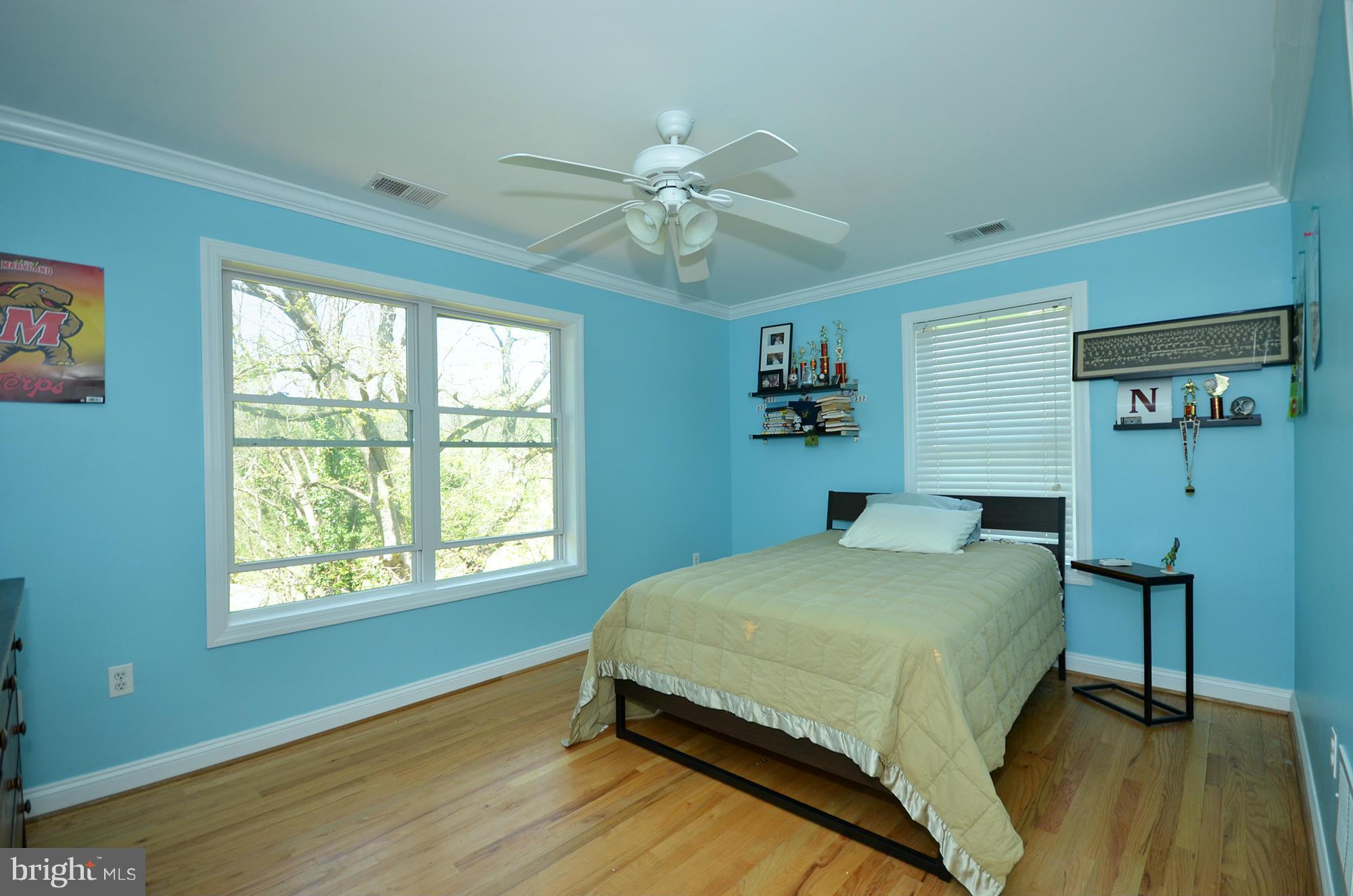 8010 Rider Avenue Baltimore, MD 21204 - Photo 11 of 29 a bedroom with a bed and a window