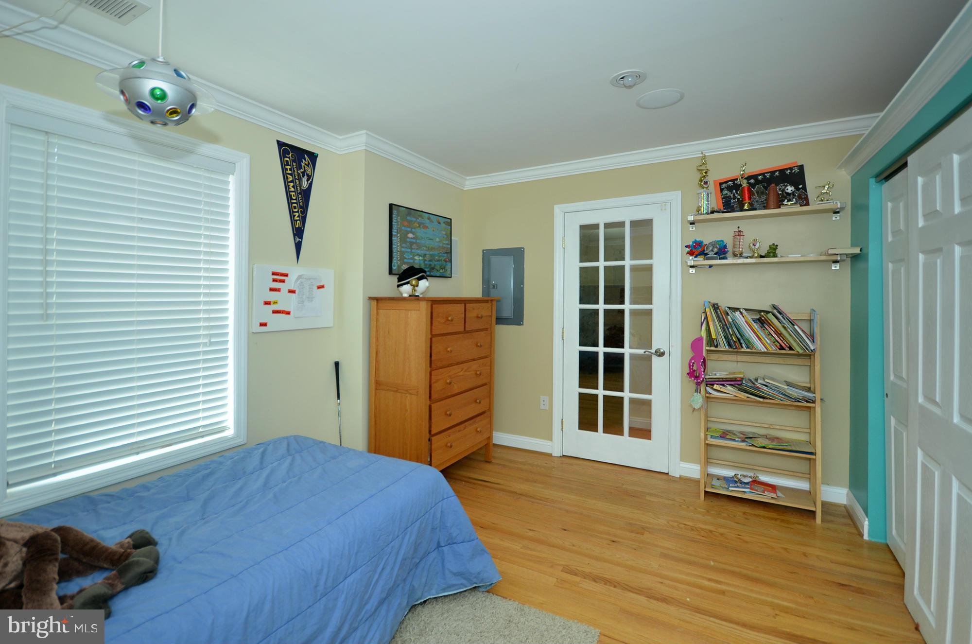 8010 Rider Avenue Baltimore, MD 21204 - Photo 18 of 29 a bedroom with a bed and a closet