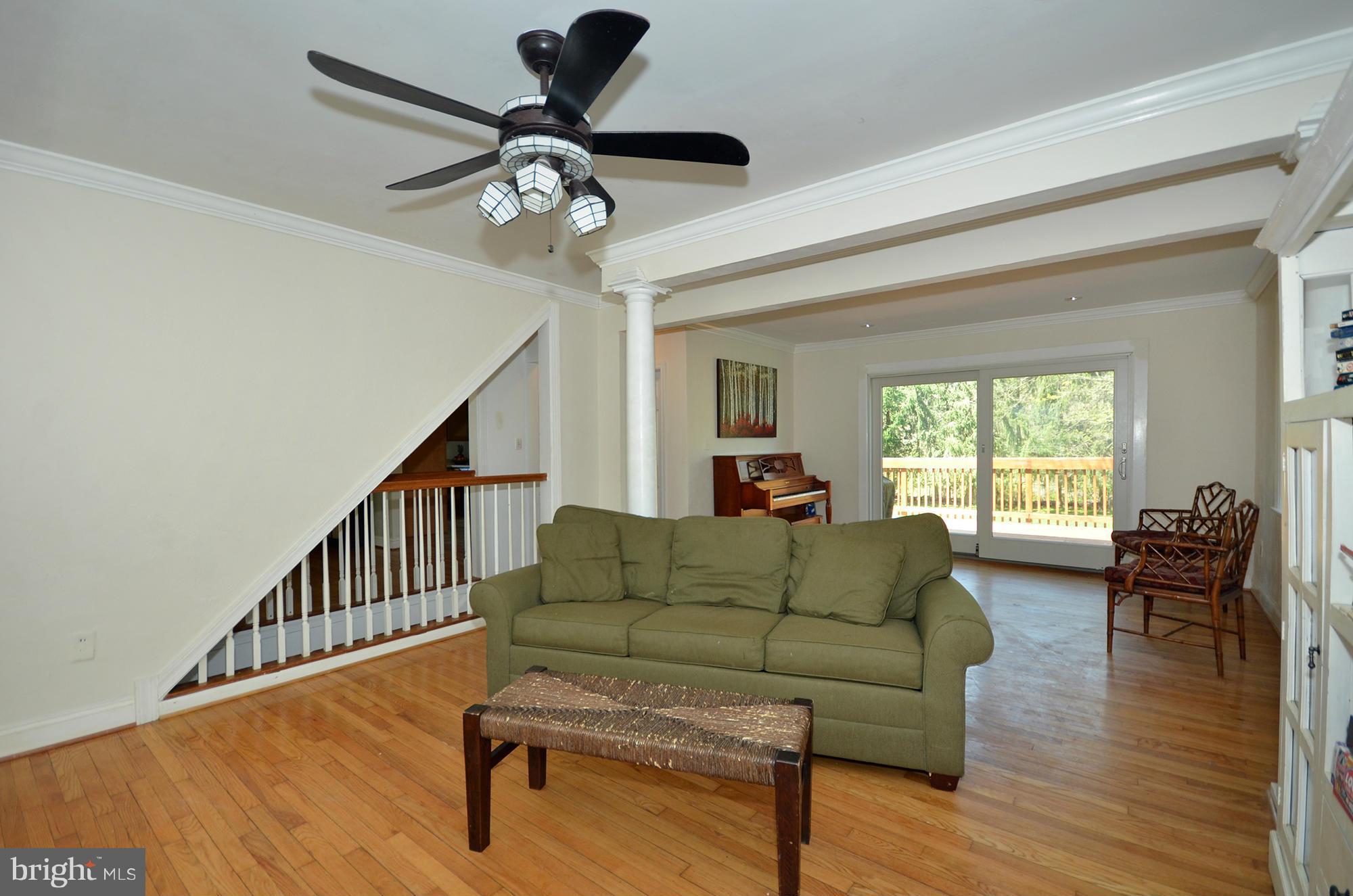 8010 Rider Avenue Baltimore, MD 21204 - Photo 8 of 29 a living room with furniture and a wooden floor