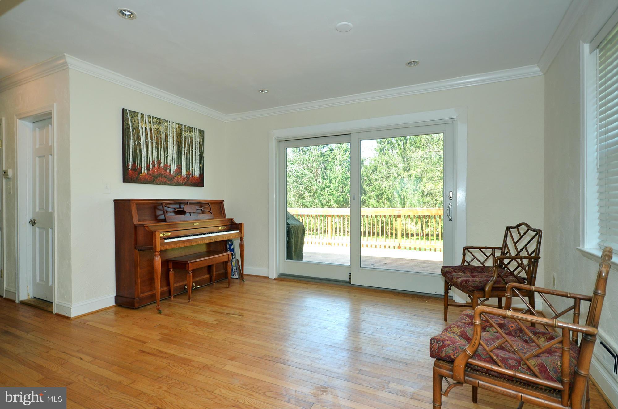 8010 Rider Avenue Baltimore, MD 21204 - Photo 9 of 29 a view of a livingroom with furniture window and wooden floor