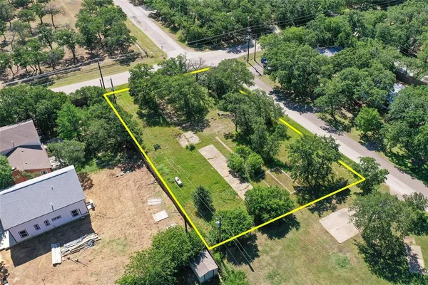 an aerial view of residential house with outdoor space