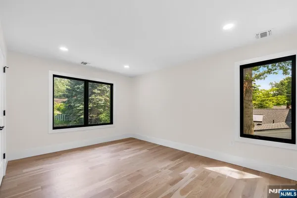 a view of a backyard with green space