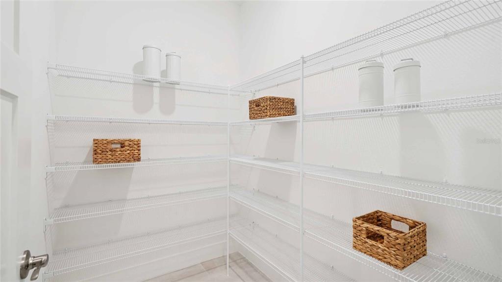 11269 Duckling Way Weeki Wachee, FL 34613 - Photo 12 of 33 a view of staircase with white walls