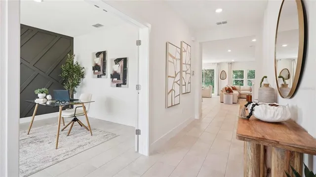a living room with furniture and a table
