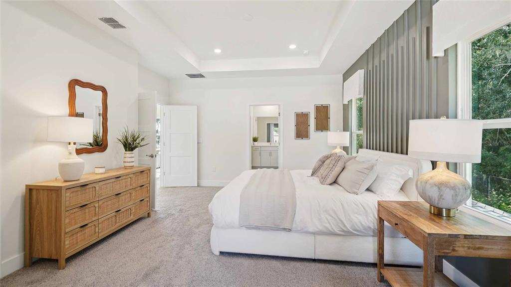 11269 Duckling Way Weeki Wachee, FL 34613 - Photo 21 of 33 a bedroom with a bed and window