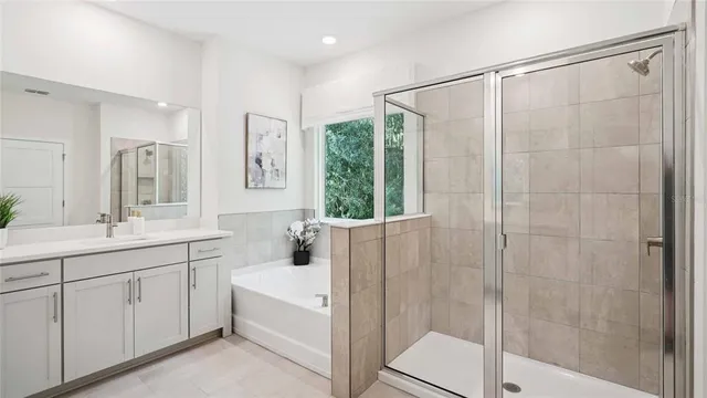a bathroom with a sink a vanity and a mirror
