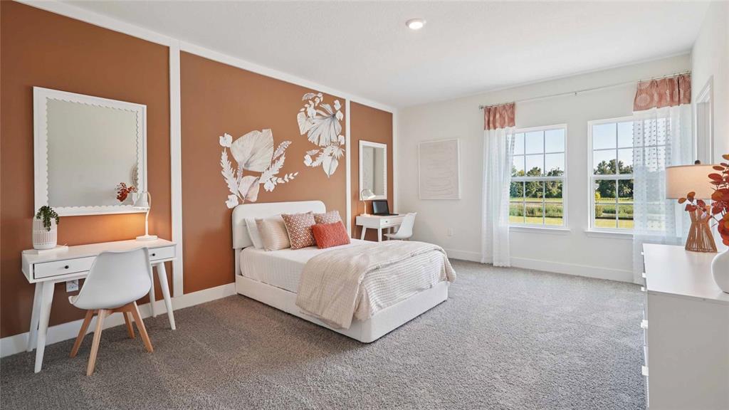 11269 Duckling Way Weeki Wachee, FL 34613 - Photo 31 of 33 a bed room with a bed and a chair