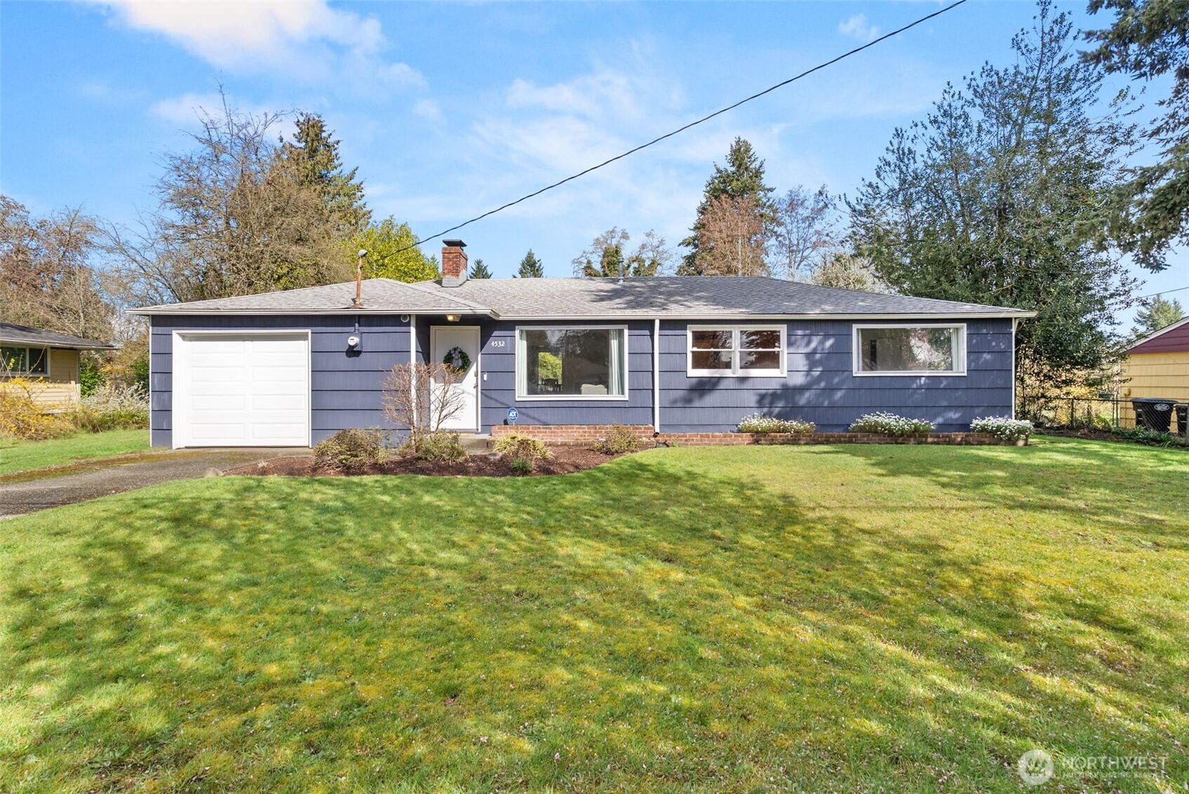 4532 14th Way Southeast Lacey, WA 98503 - Photo 1 of 22 a front view of house with yard and green space