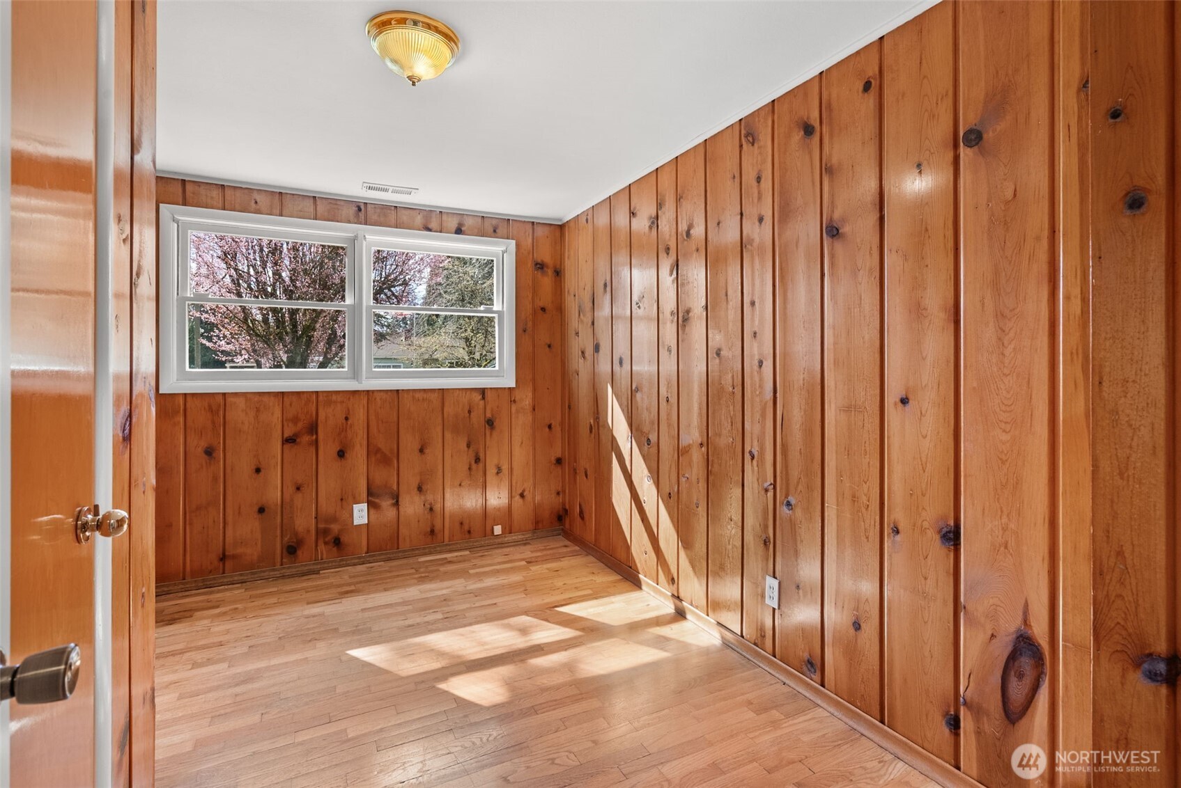 4532 14th Way Southeast Lacey, WA 98503 - Photo 12 of 22 a view of an entryway with wooden floor and door