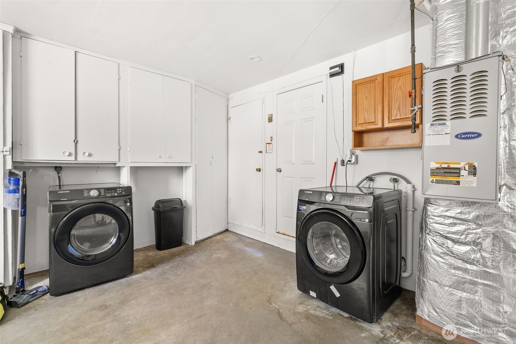 4532 14th Way Southeast Lacey, WA 98503 - Photo 15 of 22 a view of a storage & utility room with washer and dryer