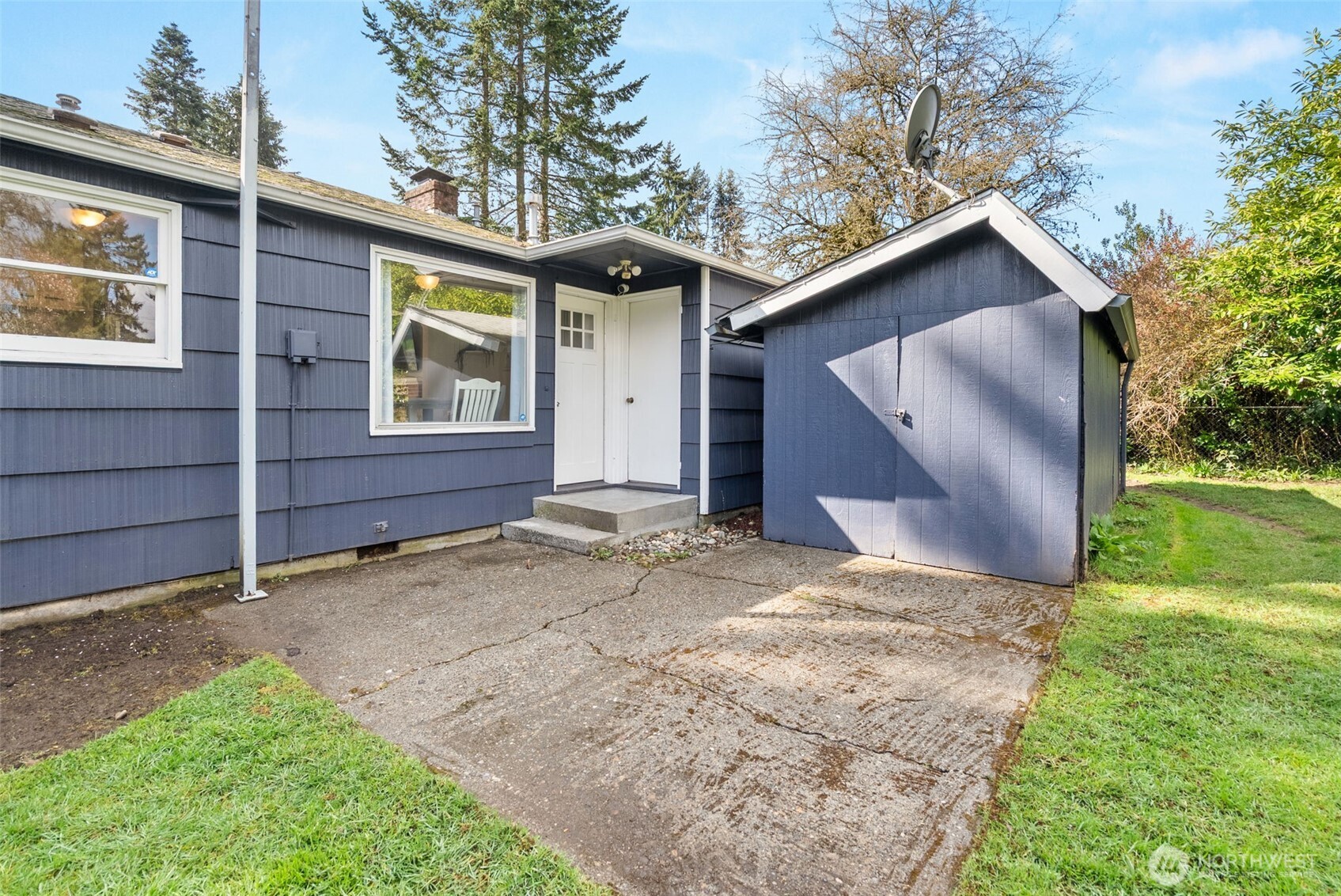 4532 14th Way Southeast Lacey, WA 98503 - Photo 17 of 22 a view of a house with a yard and garage