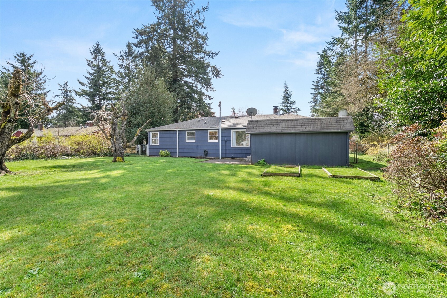 4532 14th Way Southeast Lacey, WA 98503 - Photo 19 of 22 a view of a house with a yard and sitting area