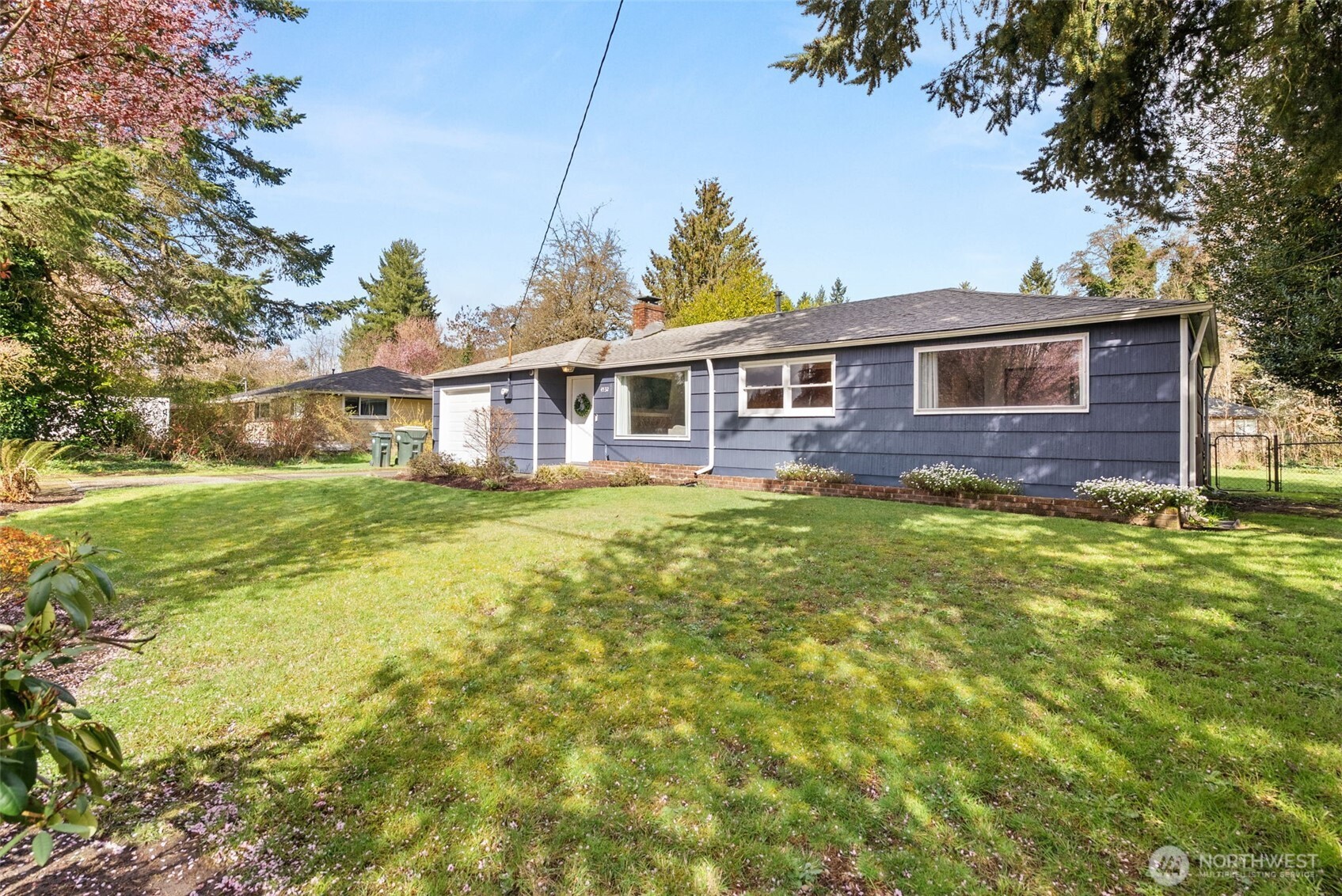 4532 14th Way Southeast Lacey, WA 98503 - Photo 20 of 22 a view of a house with a big yard and potted plants