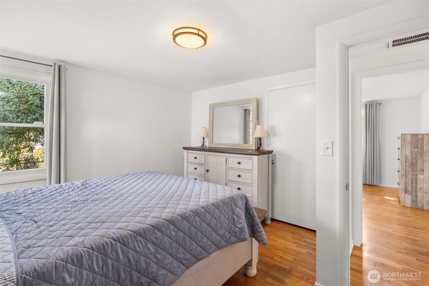 4532 14th Way Southeast Lacey, WA 98503 - Photo 10 of 22 a bedroom with a bed and a window