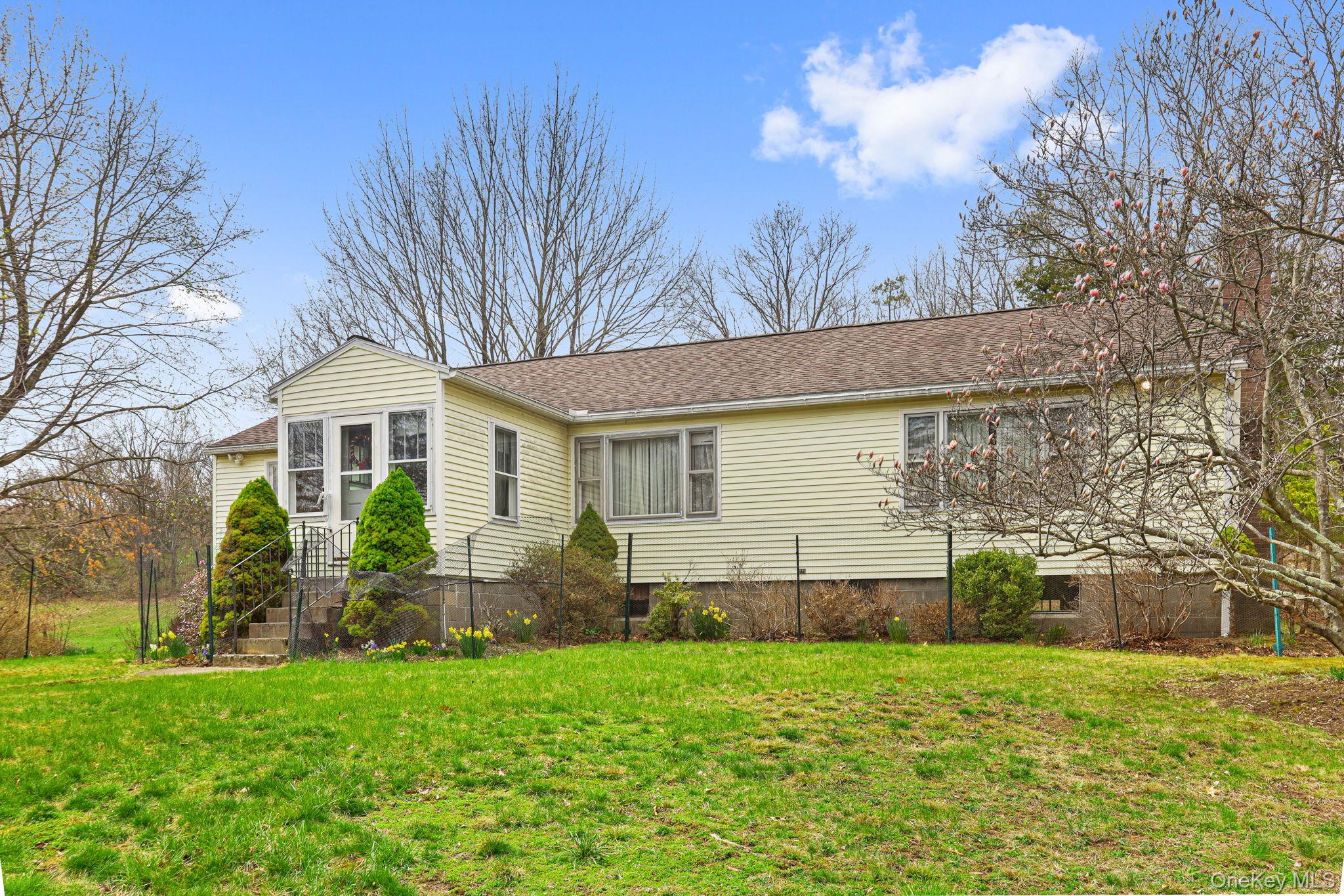 770 Gahbauer Road Hudson, NY 12534 - Photo 1 of 39 a front view of house with yard and green space