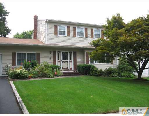 16 Surrey Road Somerset, NJ 08873 - Photo 1 of 8 a front view of a house with a yard