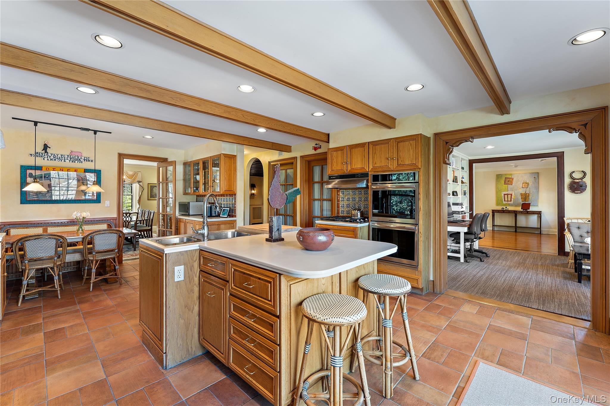 11 Mamaroneck Road Scarsdale, NY 10583 - Photo 11 of 38 Gourmet kitchen overlooking open into den area
