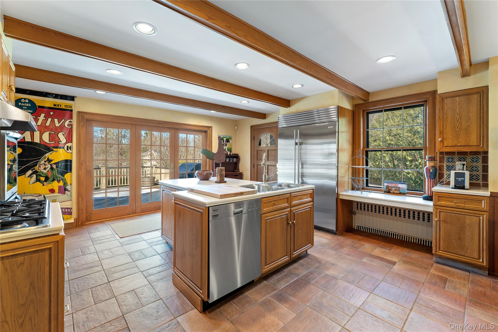 11 Mamaroneck Road Scarsdale, NY 10583 - Photo 13 of 38 View of kitchen overlooking backyard and door to deck