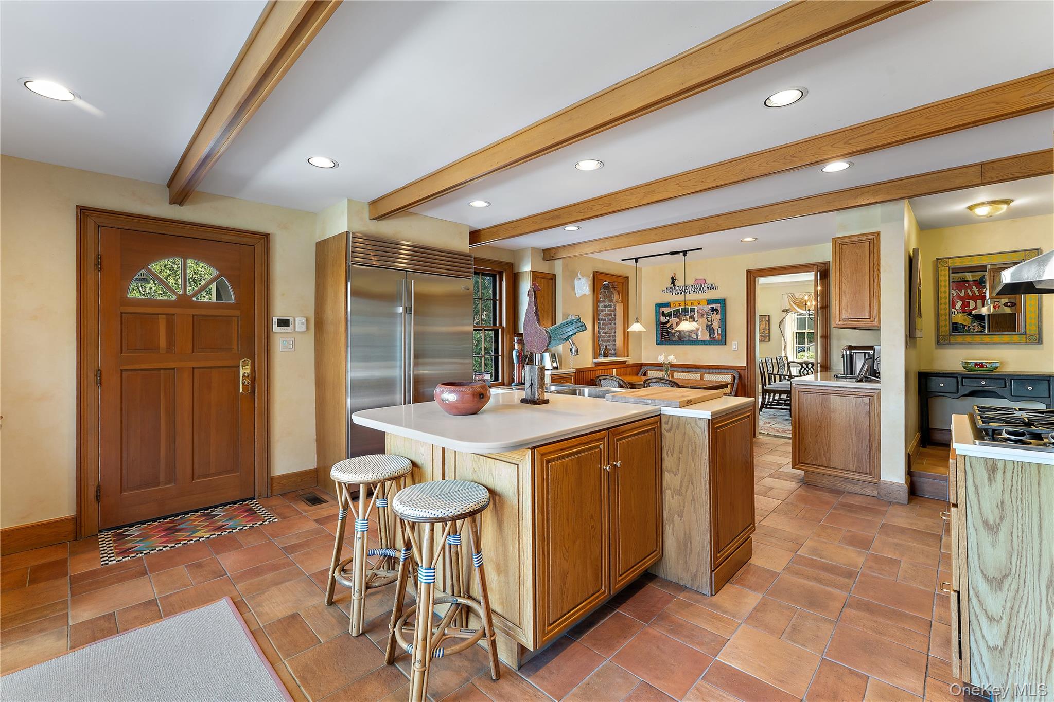 11 Mamaroneck Road Scarsdale, NY 10583 - Photo 14 of 38 View of ktichen with door to deck and center island