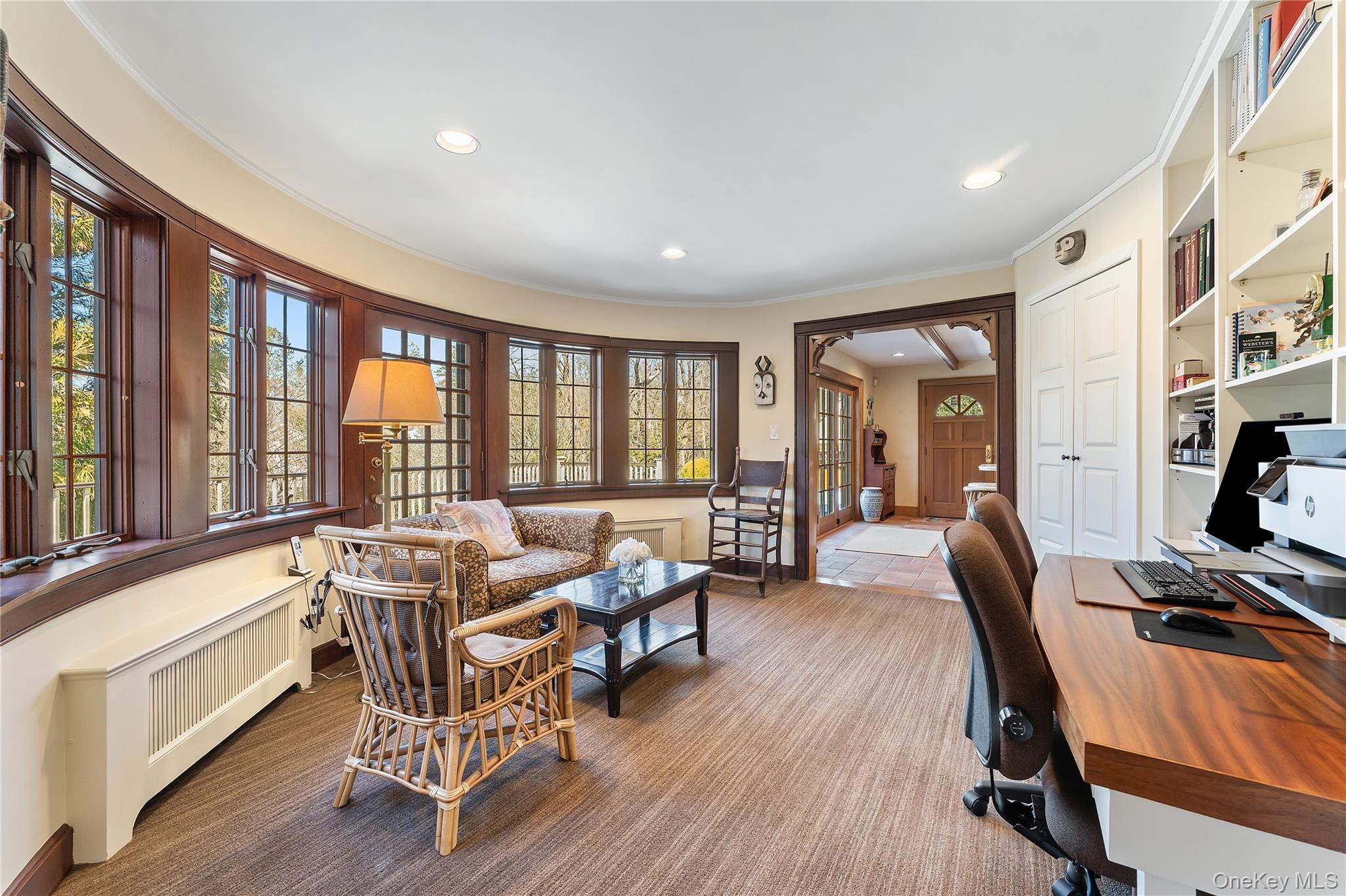 11 Mamaroneck Road Scarsdale, NY 10583 - Photo 16 of 38 View of den/library with wall of windows into kitchen