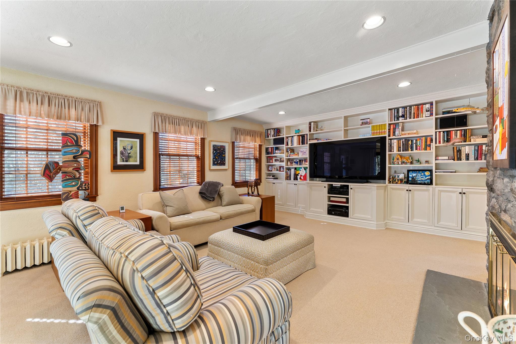 11 Mamaroneck Road Scarsdale, NY 10583 - Photo 6 of 38 Family room with custom built in cabinetry