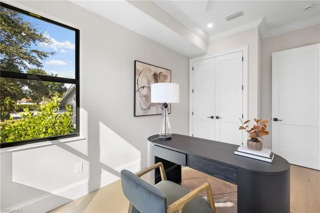 a bathroom with a sink vanity and a mirror