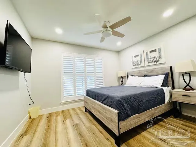 a bedroom with a bed and furniture