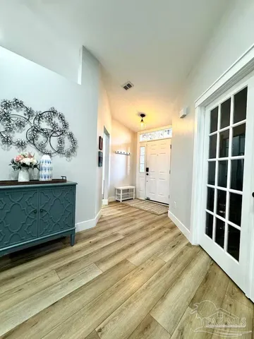 a view of a dining room with furniture