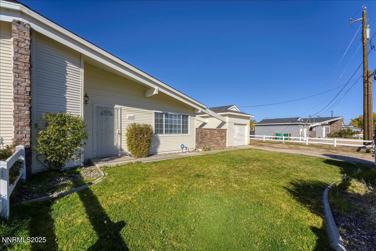 12123 Andes Street Reno, NV 89506 - Photo 2 of 24 a view of a house with pool and chairs