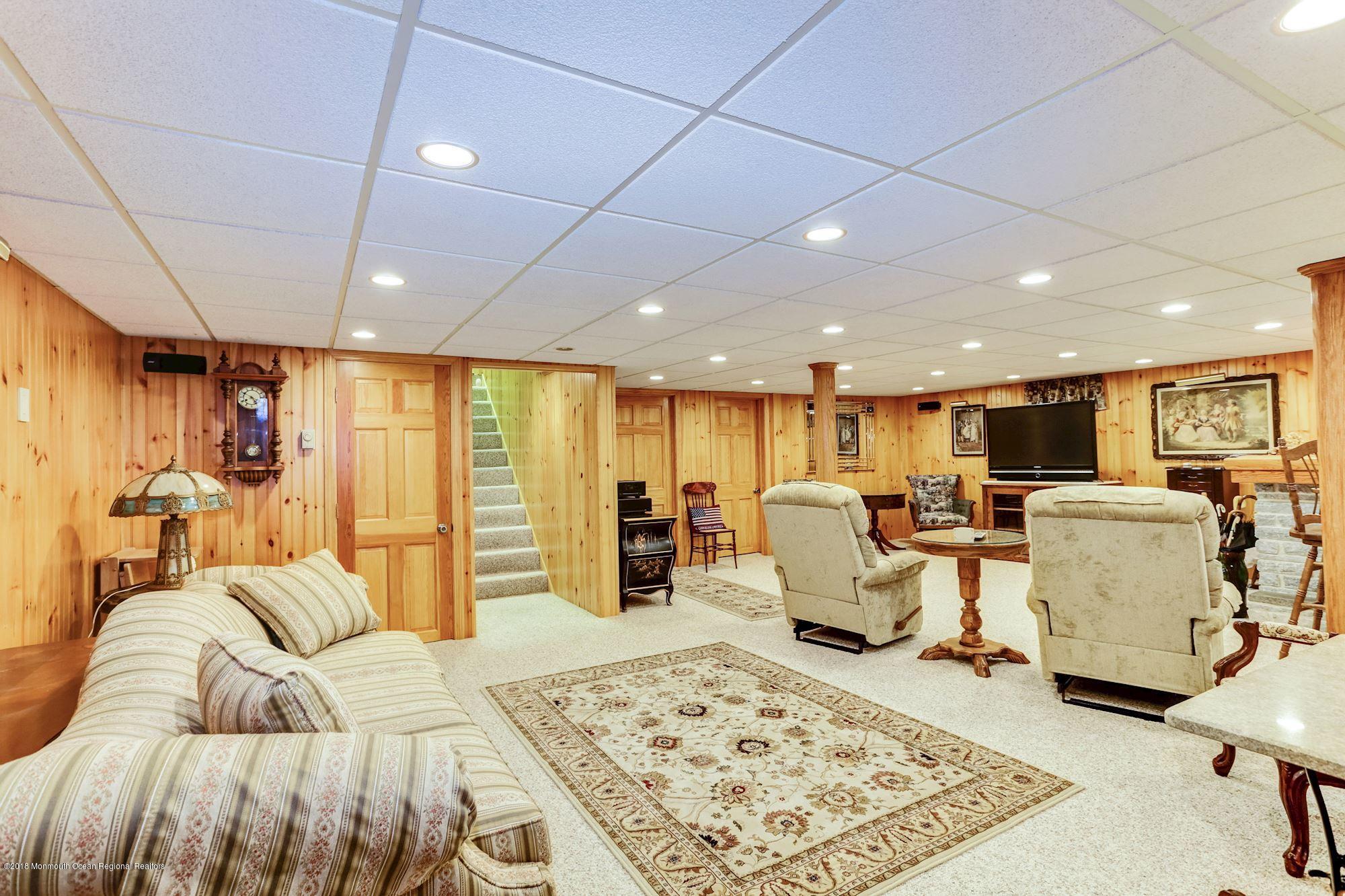 9 Kenmore Road Freehold, NJ 07728 - Photo 21 of 25 a living room with furniture