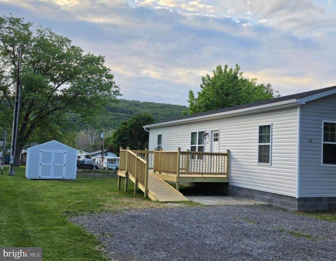 30 South Skyline Drive Ridgeley, WV 26753 - Photo 1 of 15 a view of a house with a backyard