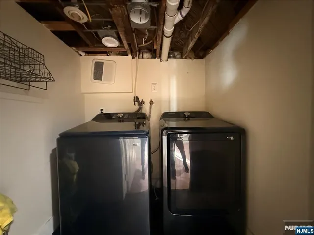 a close view of a sink and cabinets