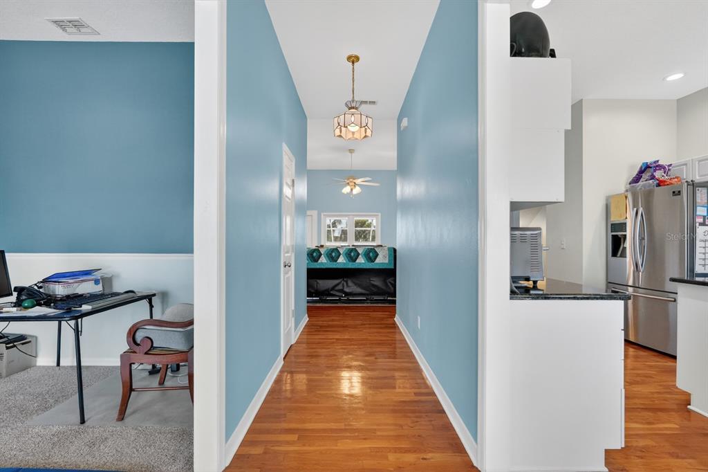 49 Loggerhead Court Ponce Inlet, FL 32127 - Photo 13 of 59 a view of a hallway view with furniture