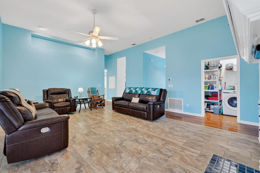 49 Loggerhead Court Ponce Inlet, FL 32127 - Photo 16 of 59 a living room with furniture and a flat screen tv
