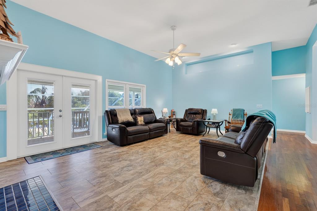 49 Loggerhead Court Ponce Inlet, FL 32127 - Photo 17 of 59 a living room with furniture and a window