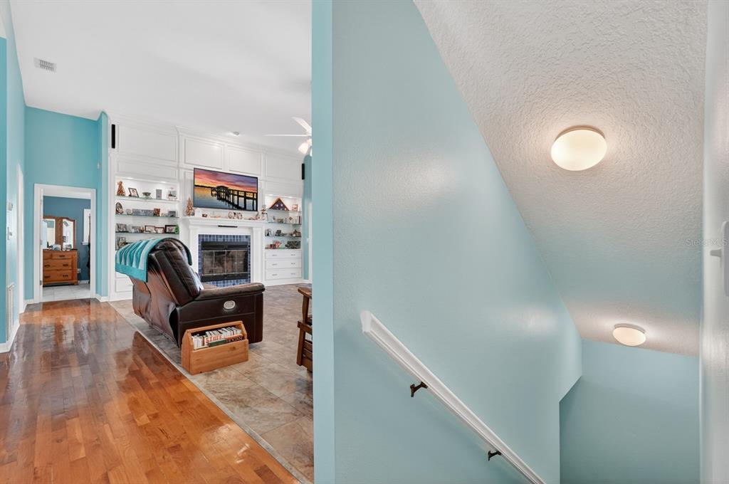 49 Loggerhead Court Ponce Inlet, FL 32127 - Photo 23 of 59 a living room with furniture and a fireplace