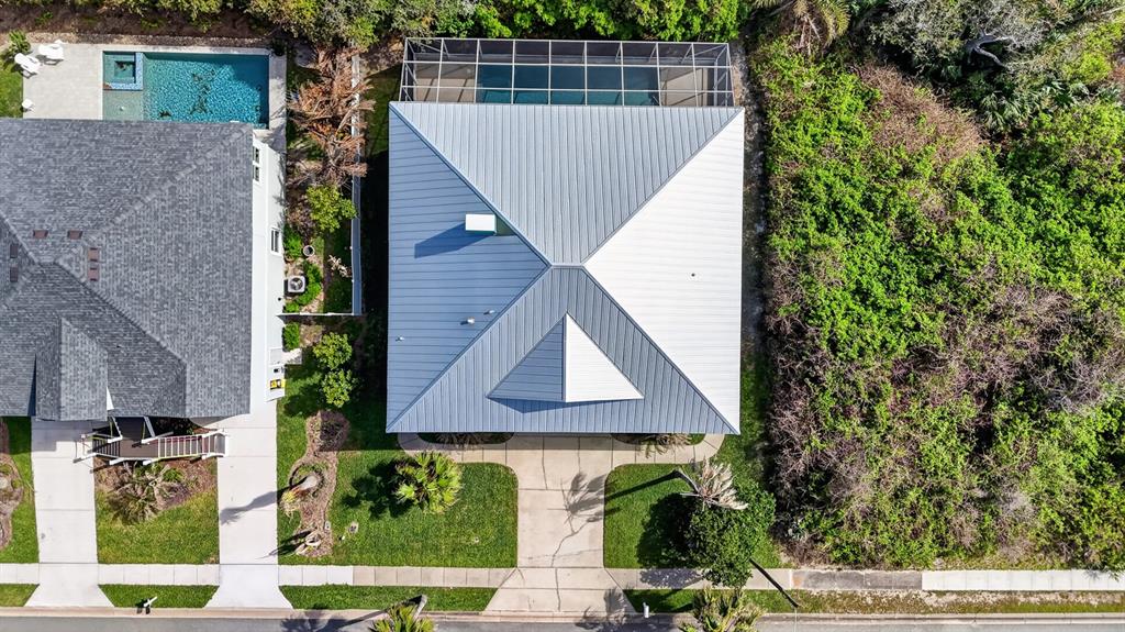 49 Loggerhead Court Ponce Inlet, FL 32127 - Photo 48 of 59 a view of balcony with wooden floor and a potted plant