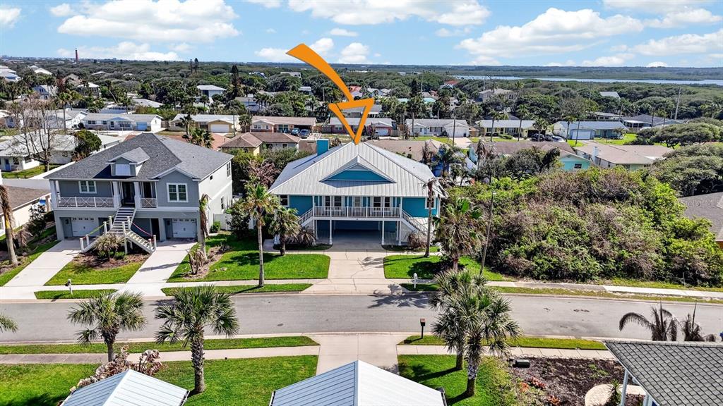 49 Loggerhead Court Ponce Inlet, FL 32127 - Photo 50 of 59 a view of multiple houses with a yard