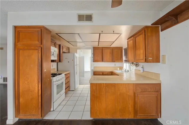 a bathroom with a sink a mirror and a shower