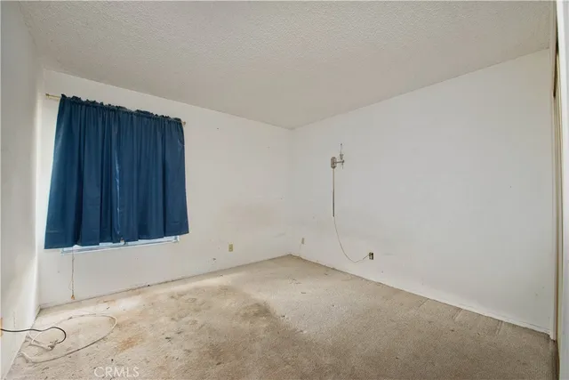 an empty room with window