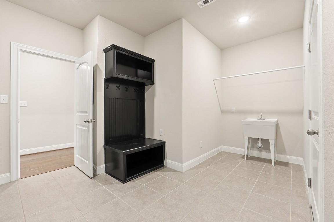 2260 Hat Bender Loop Round Rock, TX 78664 - Photo 17 of 40 a view of room with furniture and refrigerator