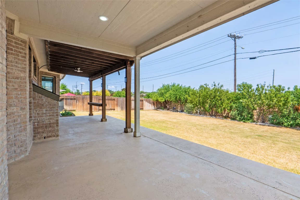 2260 Hat Bender Loop Round Rock, TX 78664 - Photo 36 of 40 a view of an empty room and floor to ceiling window