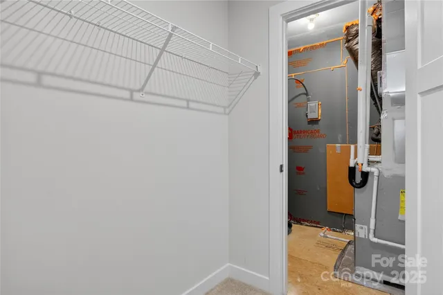 a bathroom with a shower and a sink