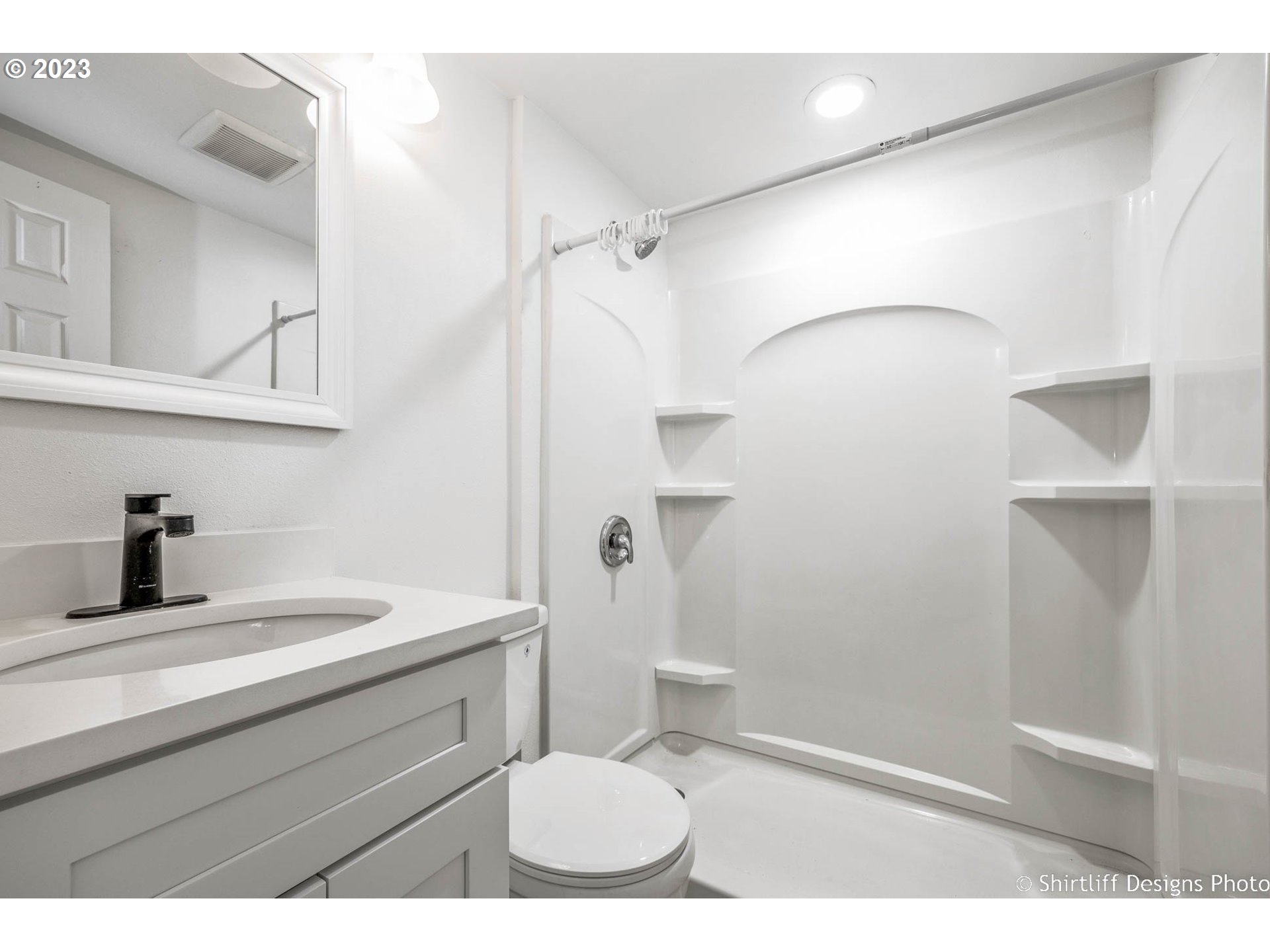 735 West M Street Springfield, OR 97477 - Photo 21 of 29 a bathroom with a sink a toilet and shower