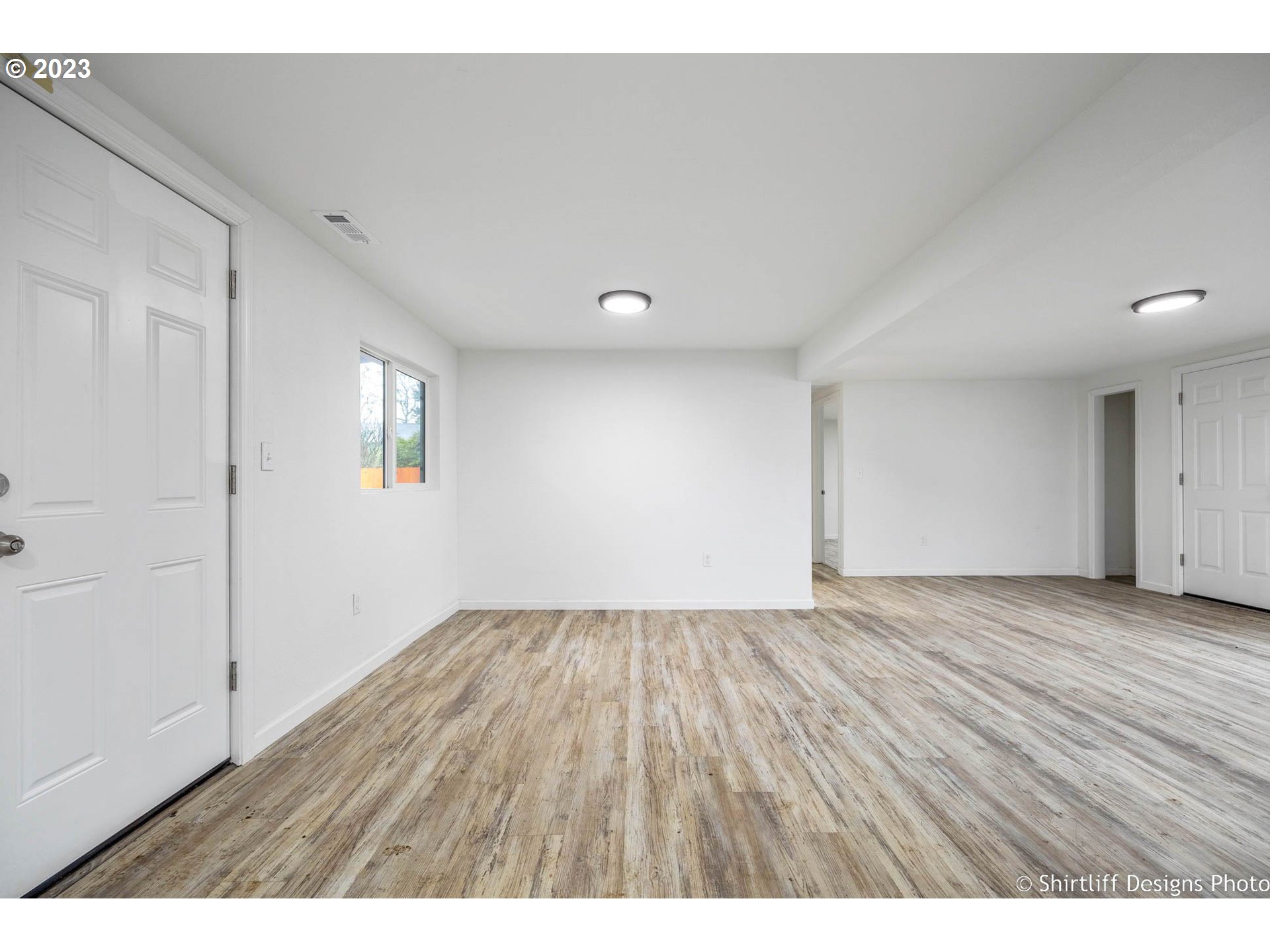 735 West M Street Springfield, OR 97477 - Photo 3 of 29 a view of an empty room and wooden floor