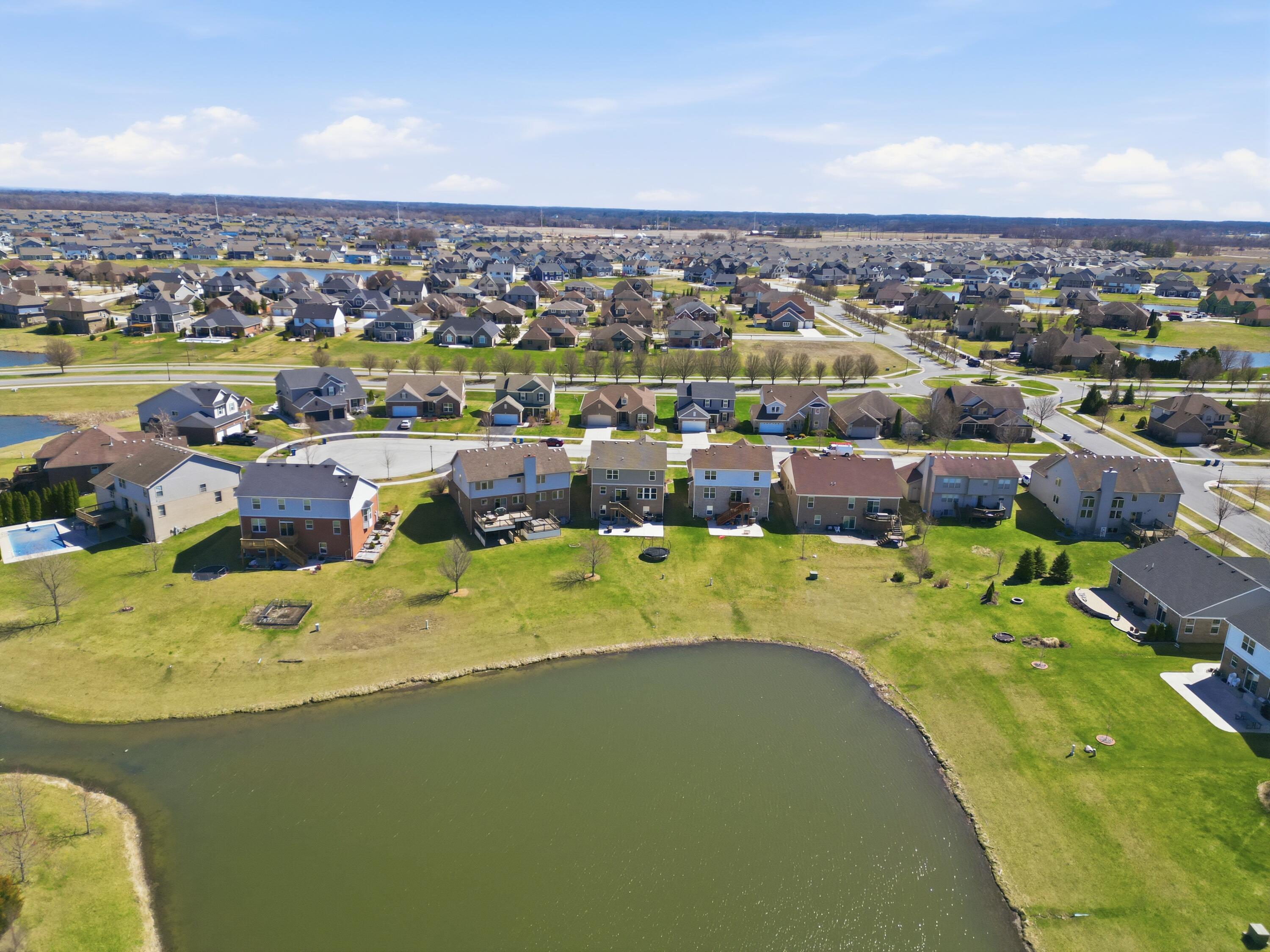 10322 Adler Cove St. John, IN 46373 - Photo 4 of 26 a view of a city with an ocean