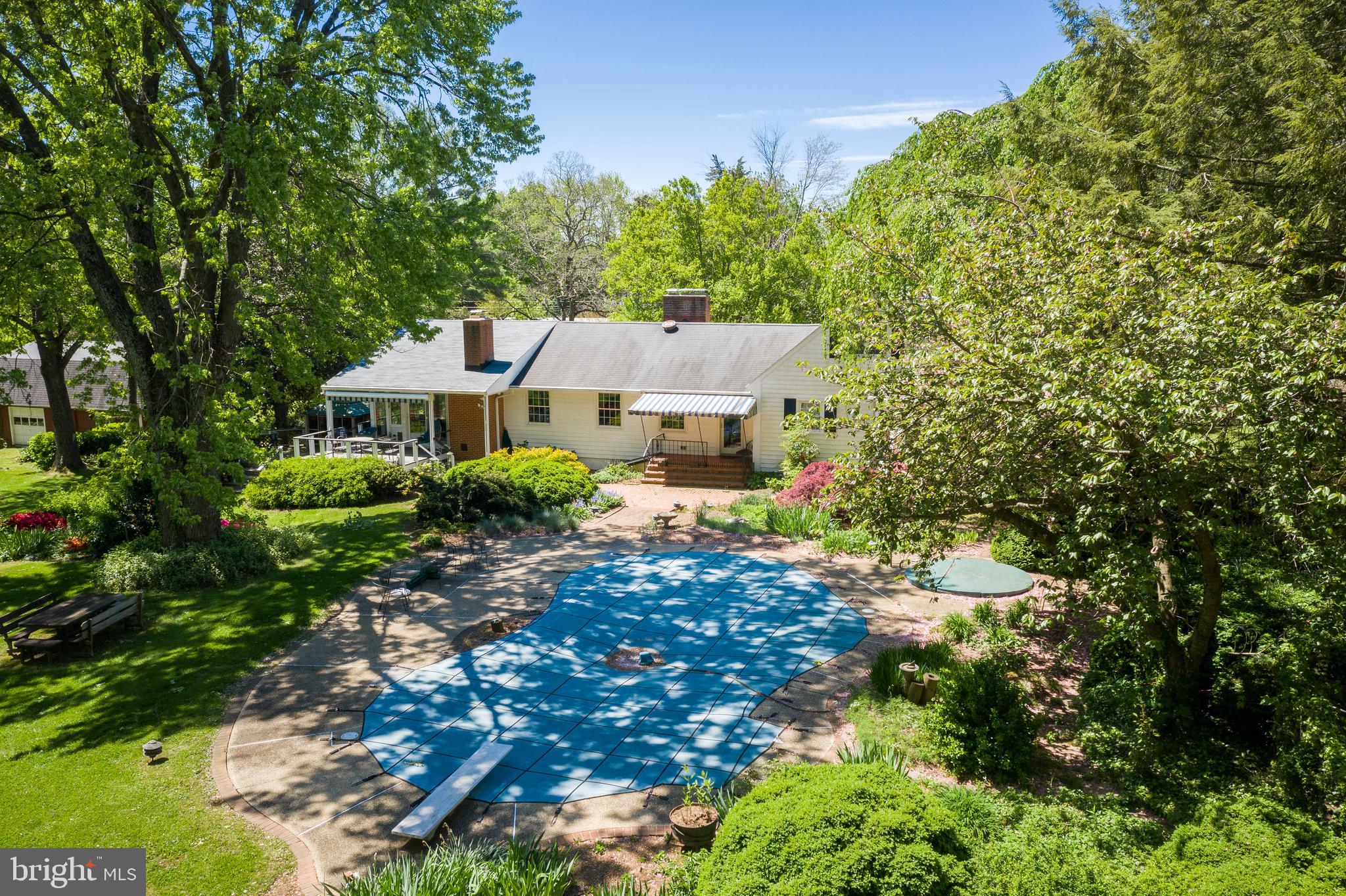 1533 Widows Mite Road Edgewater, MD 21037 - Photo 18 of 29 a aerial view of a house with a yard and large trees