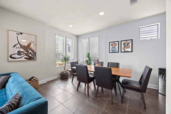 a kitchen with a refrigerator a stove a sink and a refrigerator